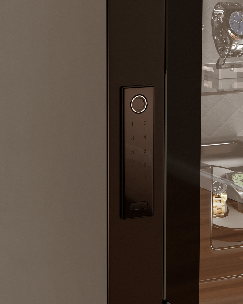 Mycube Glass in Onyx Black, close-up of the biometric keypad beside watches on display