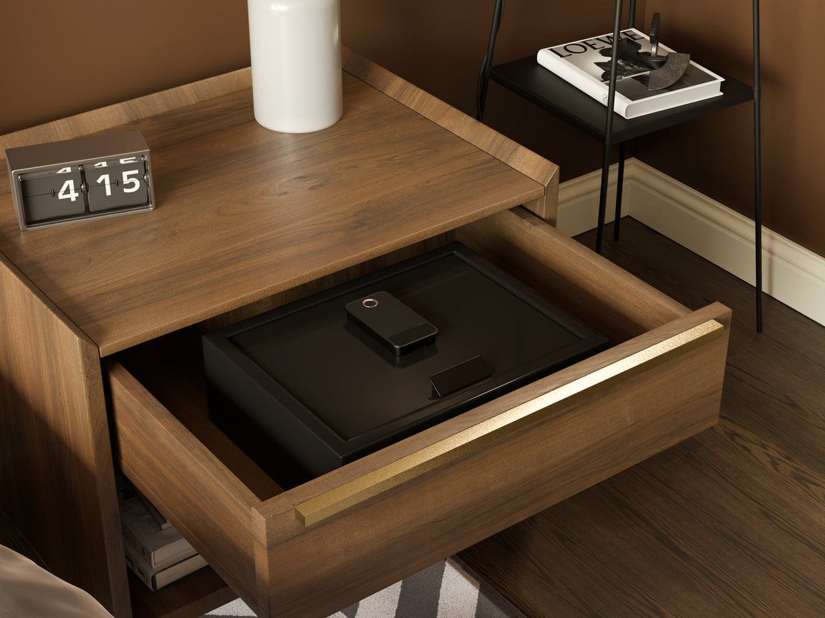 Mycube In-Drawer 15 inch safe in Onyx Black, three-quarter view closed inside an open bedside drawer