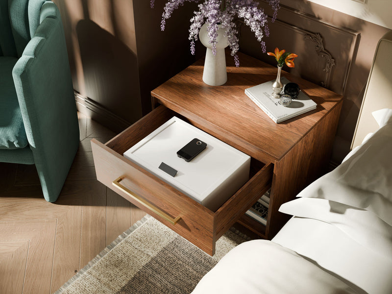 Mycube In-Drawer 15 inch safe in Mycube White, three-quarter view closed inside an open bedside drawer