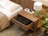 Mycube In-Drawer 19 inch safe in Onyx Black, three-quarter view closed inside an open bedside drawer
