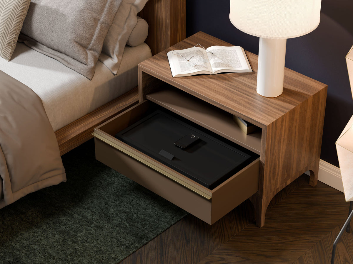 Mycube In-Drawer 23 inch safe in Onyx Black, three-quarter view closed inside an open bedside drawer