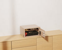 Mycube Mini safe in Cafe Au Lait with push-button keypad, three-quarter view with the door open