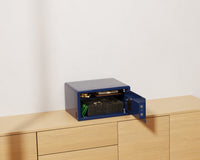 Mycube Mini safe in Midnight Blue with push-button keypad, three-quarter view with the door open
