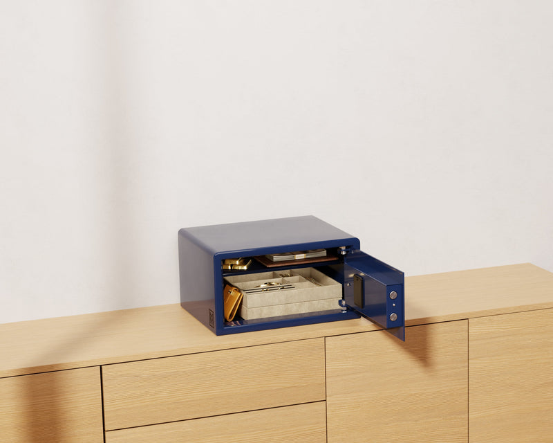 Mycube Mini safe in Midnight Blue with biometric touchpad, three-quarter view with the door open