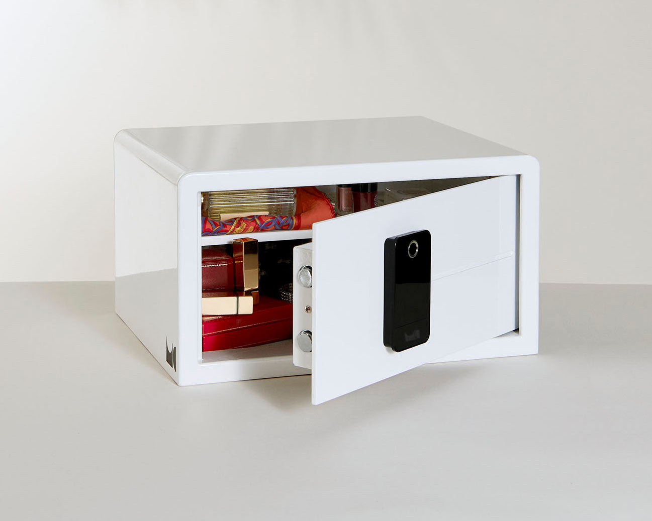 An open white Biocube Mini showing personal belongings inside