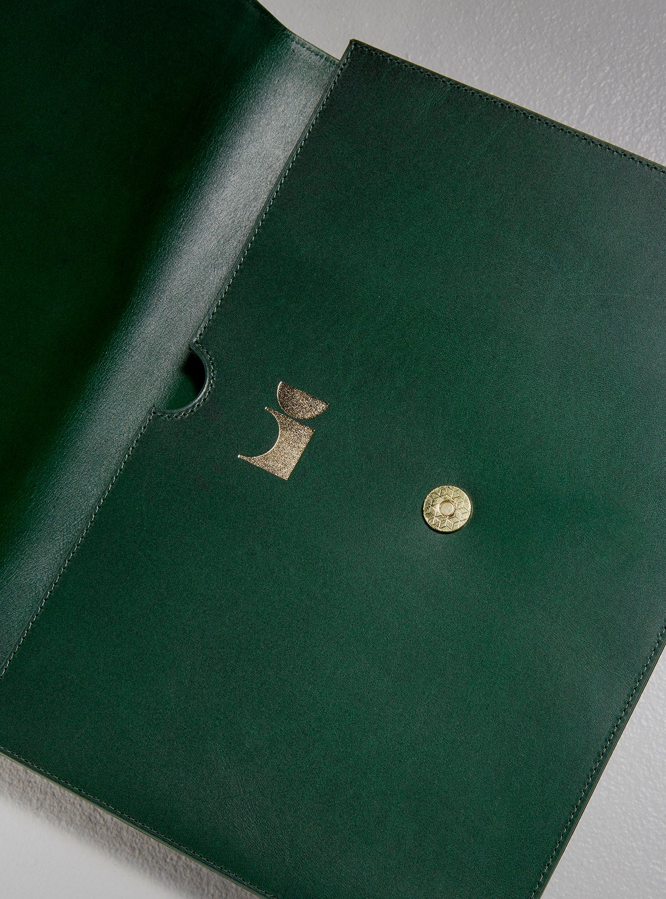 Leather green document folio unbuttoned